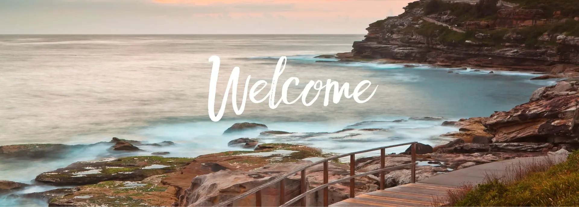 Welcoming banner featuring South Coogee beach walking