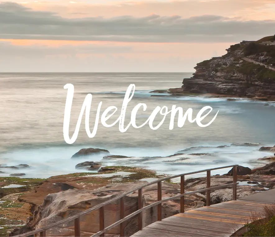 Welcoming banner featuring South Coogee beach walking